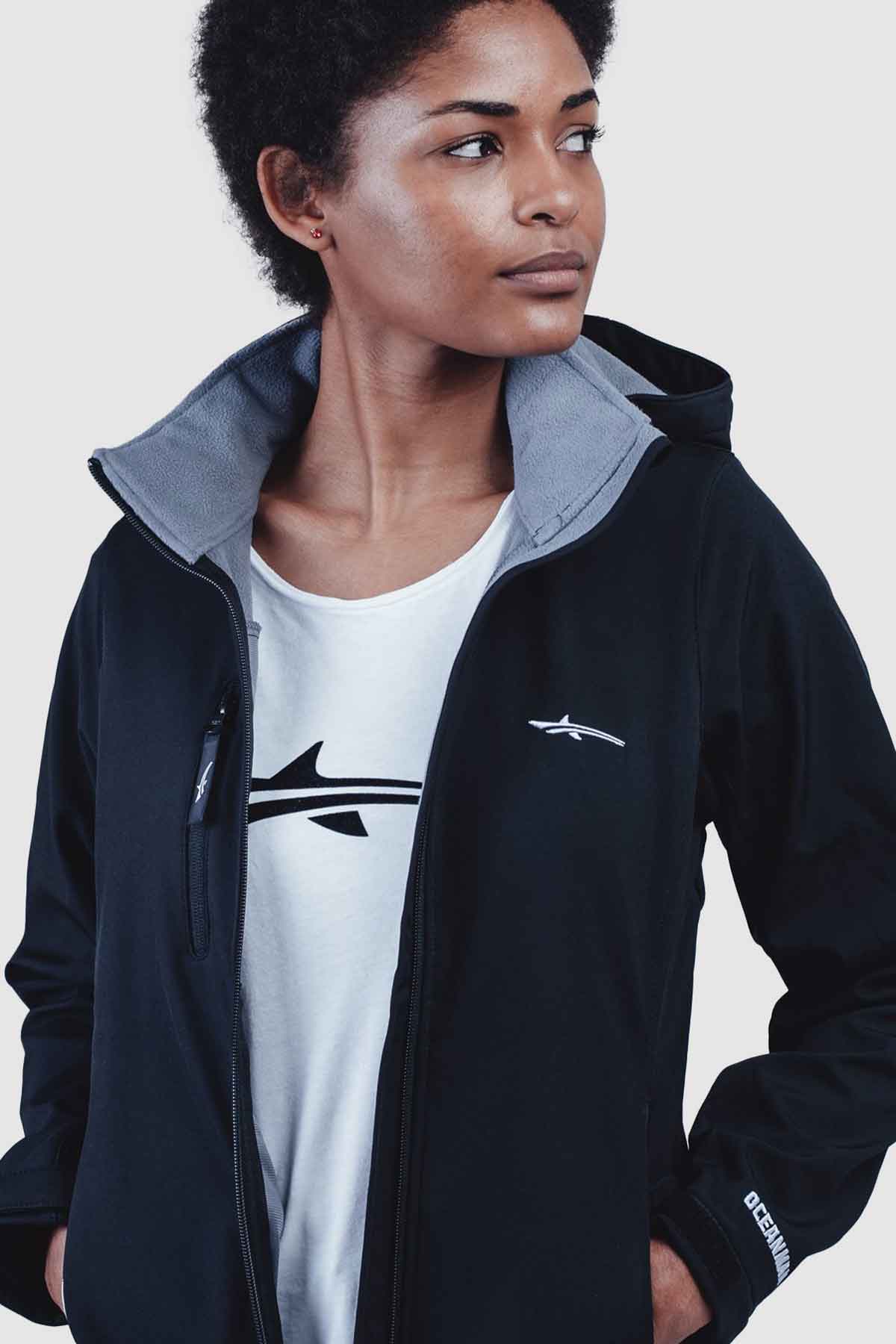 Black jacket and white oceanman t shirt